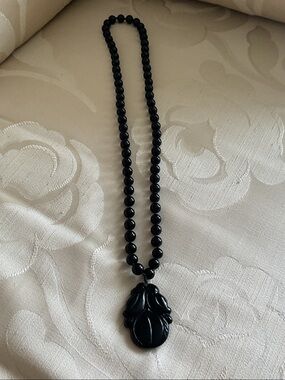 Onyx Beads 30" with Carved Peach Pendant